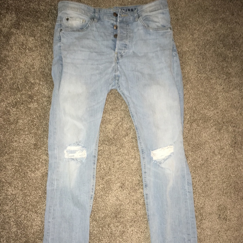 Blue distressed jeans
